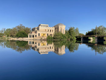 Reflection of buildings in lake