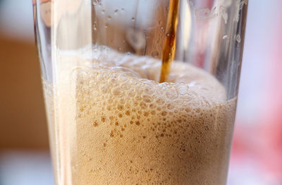 Close-up of coffee in glass