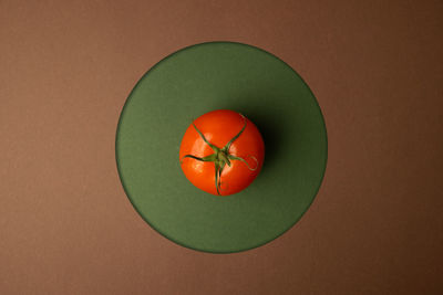 High angle view of orange fruit on table