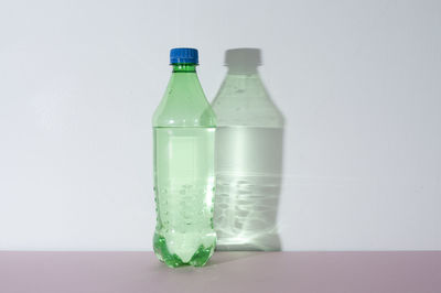 Close-up of bottle against white background