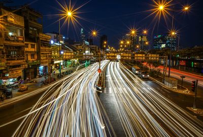 High angle view of light trails on road at night