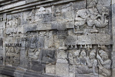 Text on stone wall at temple