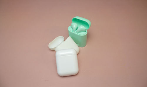 High angle view of toy bottle against white background