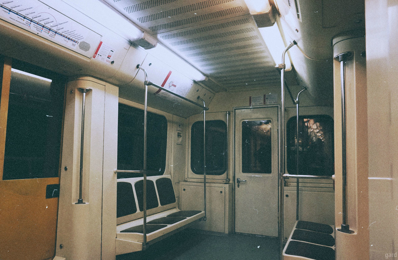 vehicle interior, train, rail transportation, train - vehicle, mode of transportation, public transportation, transportation, vehicle seat, seat, empty, window, indoors, no people, illuminated, passenger train, absence, glass - material, door, train interior, subway train