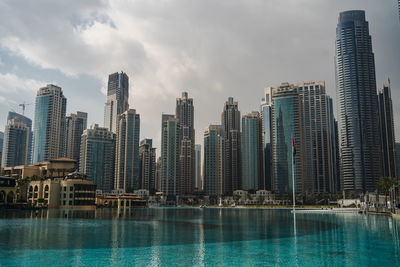 Buildings in city against sky