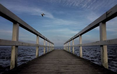 Wooden pier over lake