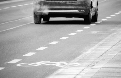 Close-up of car on street