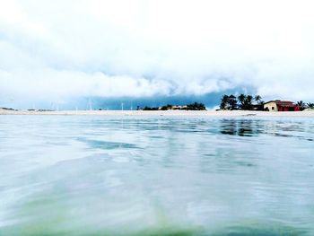 Surface level of sea against sky