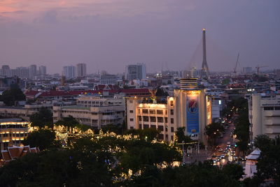 High angle view of illuminated buildings at night