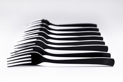 Close-up of stack against white background