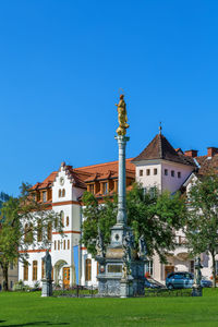 Plague column in garden in front of seckau abbey, austria