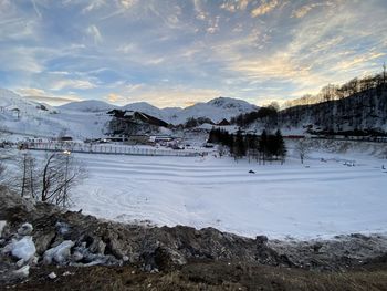 Scenic view of snowcapped mountains against sky