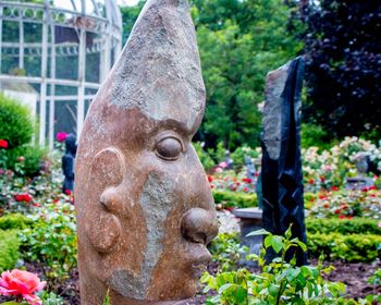 Close-up of statue against plants