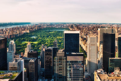 High angle view of buildings in city against sky