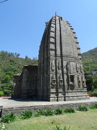 Exterior of temple against clear sky