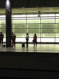 People walking on escalator