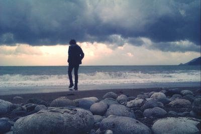 Scenic view of sea against cloudy sky