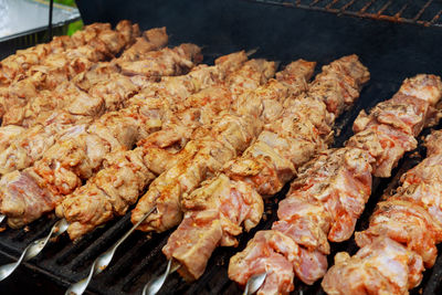 Close-up of meat on barbecue grill