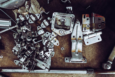 Close-up of metal equipments on table