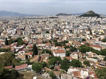 Aerial view of townscape against sky