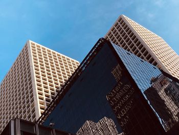 Low angle view of modern building against sky