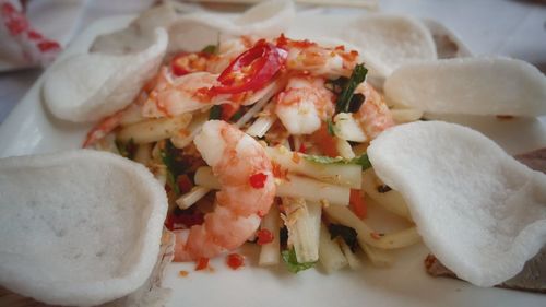 High angle view of chopped vegetables in plate