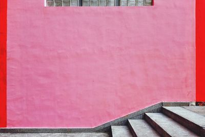 Steps by pink wall