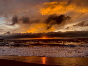 Scenic view of sea against sky during sunset