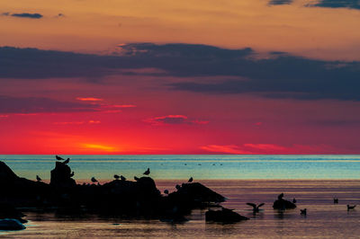 Scenic view of sea against sky during sunset