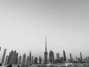 Low angle view of city against clear sky