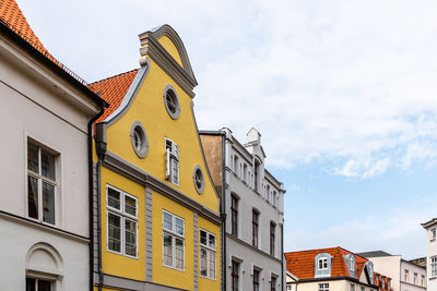 Low angle view of buildings against sky