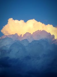 Low angle view of mountains against sky during sunset