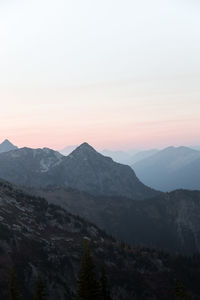 Scenic view of mountains against sky during sunset