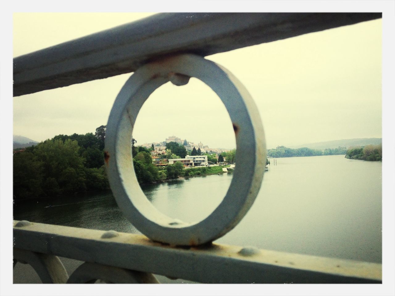 water, river, bridge - man made structure, built structure, architecture, connection, transportation, metal, sky, railing, transfer print, bridge, clear sky, tree, auto post production filter, reflection, day, no people, lake, outdoors