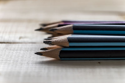 Close-up of colored pencils on table