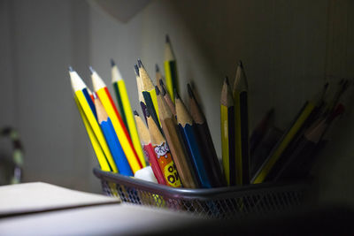 Close-up of colored pencils on table