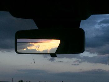 Low angle view of car against sky