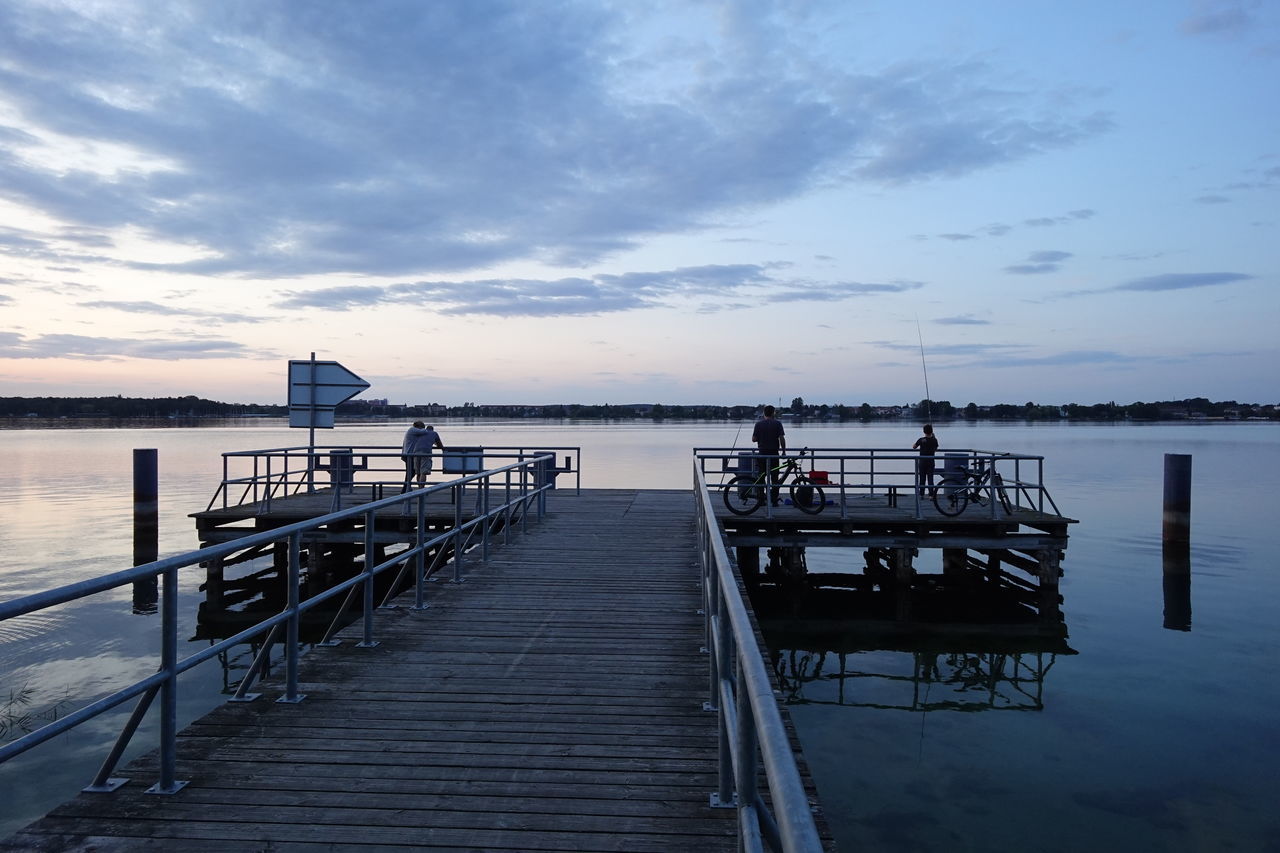 sky, water, pier, cloud - sky, sea, nautical vessel, transportation, scenics - nature, beauty in nature, sunset, jetty, nature, tranquility, wood - material, tranquil scene, mode of transportation, the way forward, direction, railing, outdoors, no people