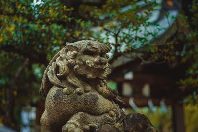 Statue of tree in park