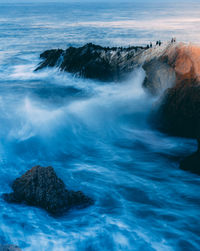 Scenic view of rocks in sea