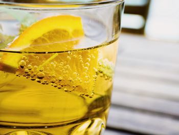 Close-up of beer glass on table