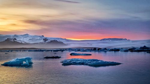 Scenic view of sea against sky during sunset