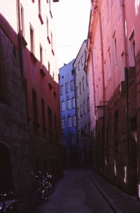 Road amidst buildings in city