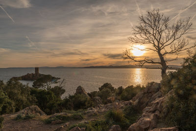 Scenic view of sea against sky during sunset