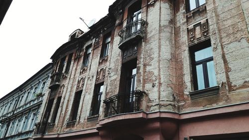 Low angle view of old building against sky