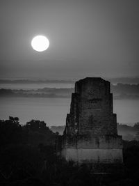 Castle against sky at night