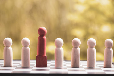 Close-up of chess pieces on table