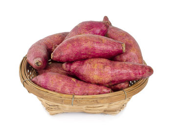 Close-up of fresh basket against white background