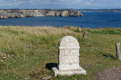 Stone cross in cemetery