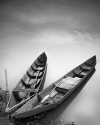 Boat moored at harbor